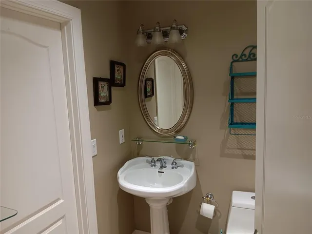 a bathroom with a toilet and a bathtub