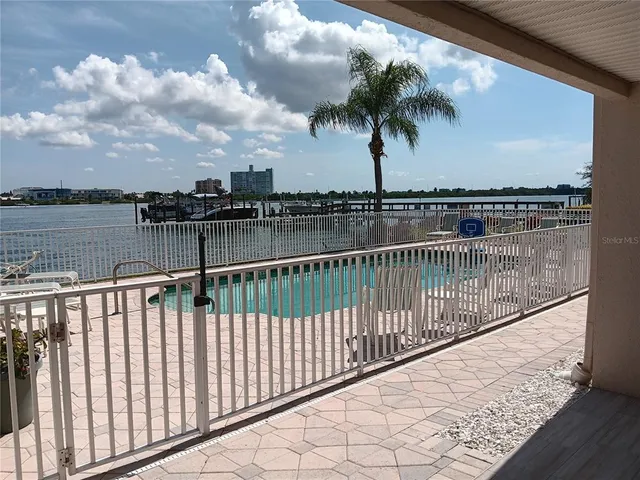 a view of a balcony with lake view