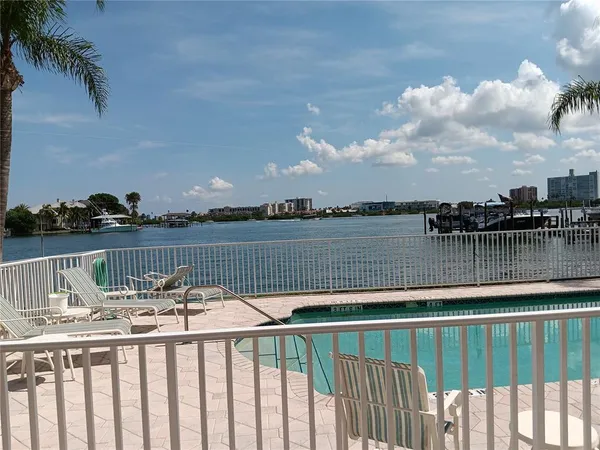 a view of a lake from a balcony