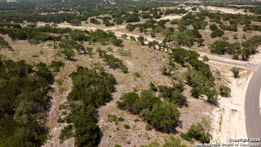Tbc Bell Canyon Way Bulverde, TX 78163 - Photo 8 of 8 a view of a city with green field