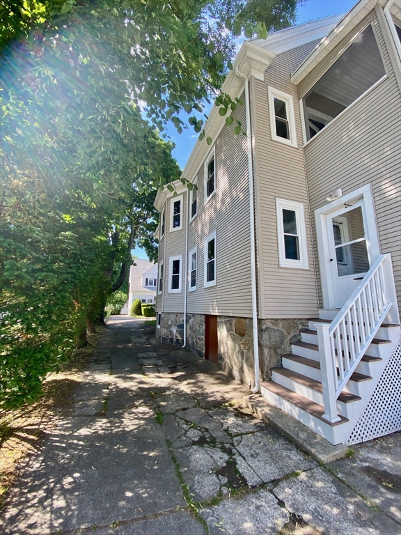 14 Welton Road Boston, MA 02132 - Photo 2 of 31 a view of a house with a yard