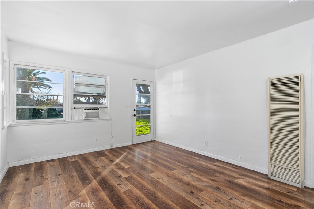 735 Michigan Avenue Beaumont, CA 92223 - Photo 8 of 19 an empty room with windows