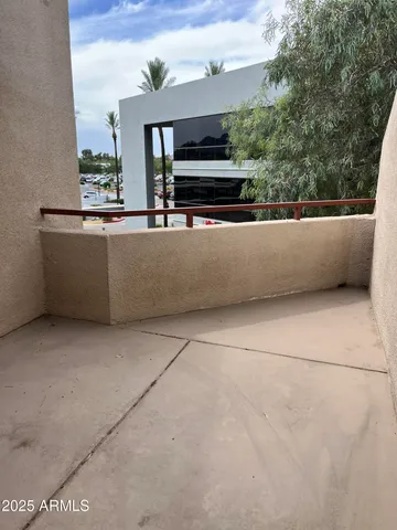 a view of balcony and kitchen