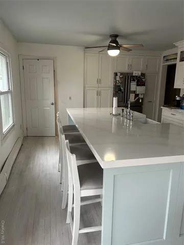 a view of kitchen and windows