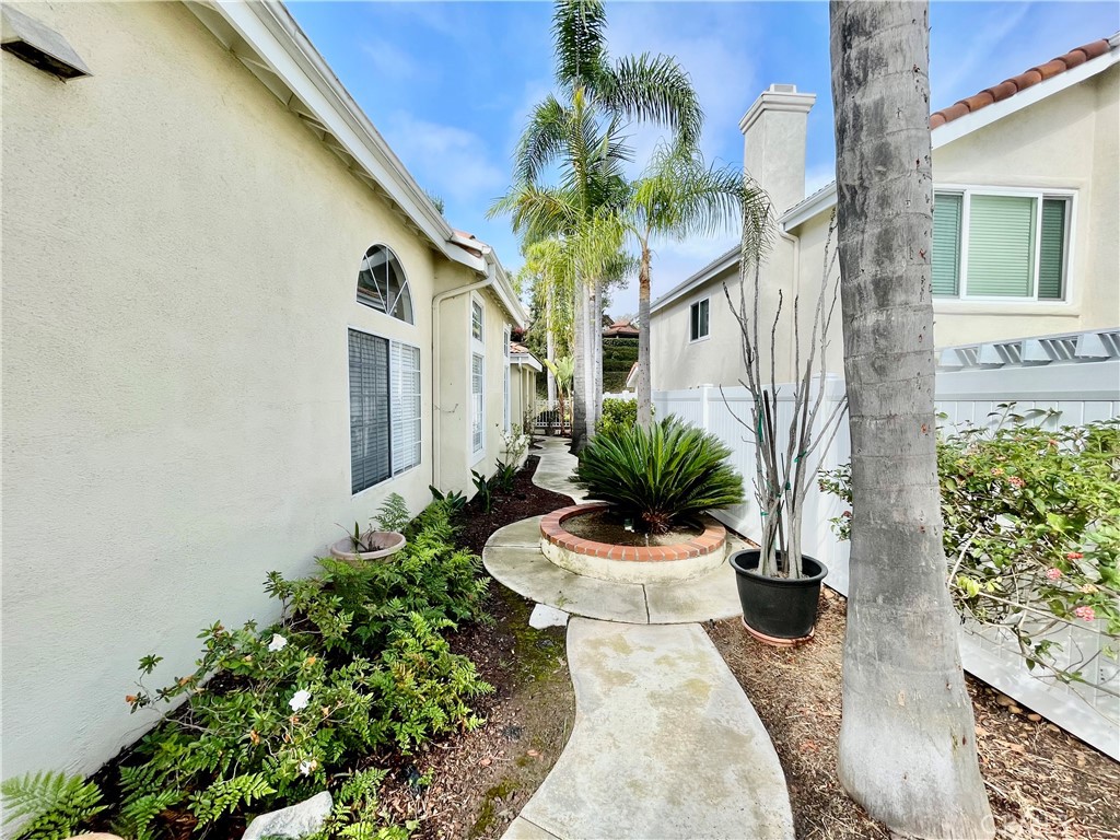 28182 Rancho Azul Laguna Niguel, CA 92677 - Photo 9 of 39 a view of a house with a yard and potted plants
