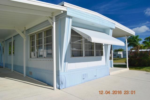 7039 Southeast Ridgeway Terrace Hobe Sound, FL 33455 - Photo 36 of 38 Front