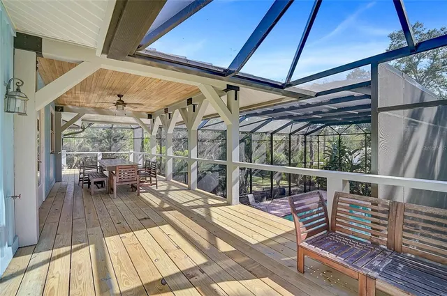 a view of two chairs in the balcony