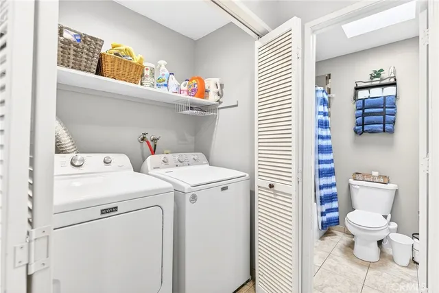 a bathroom with a toilet and a sink