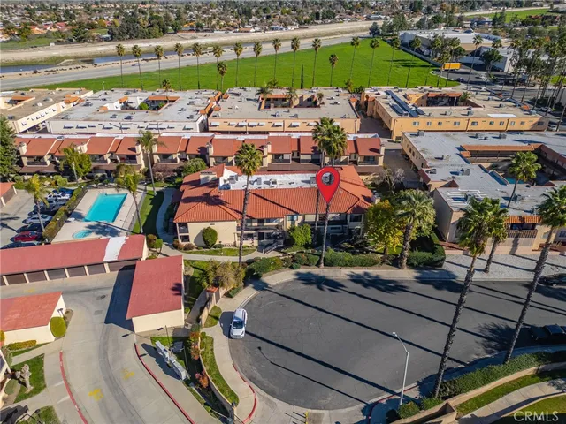 an aerial view of a houses with outdoor space