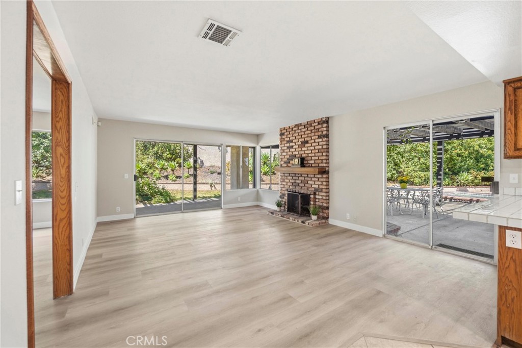 5895 Jadeite Avenue Rancho Cucamonga, CA 91737 - Photo 19 of 71 wooden floor in an empty room with a window