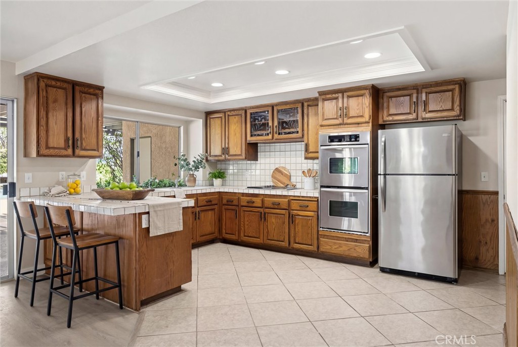 5895 Jadeite Avenue Rancho Cucamonga, CA 91737 - Photo 22 of 71 Virtual staged kitchen
