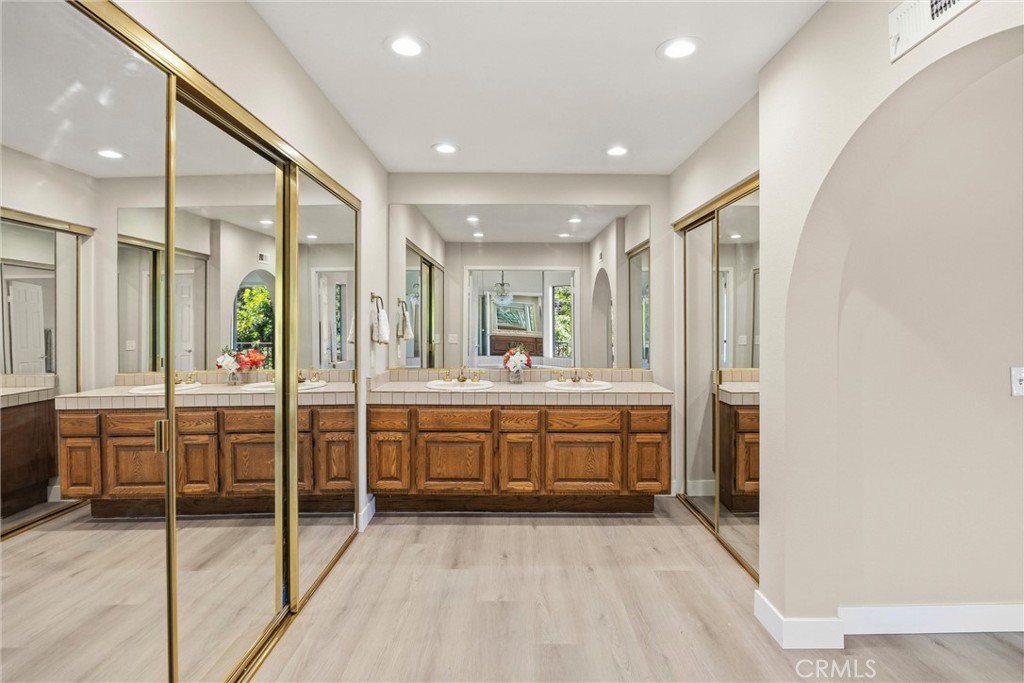 5895 Jadeite Avenue Rancho Cucamonga, CA 91737 - Photo 36 of 71 a large bathroom with a large tub and sink
