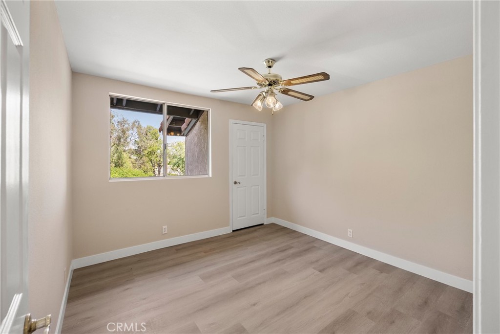 5895 Jadeite Avenue Rancho Cucamonga, CA 91737 - Photo 41 of 71 an empty room with a window and a fan