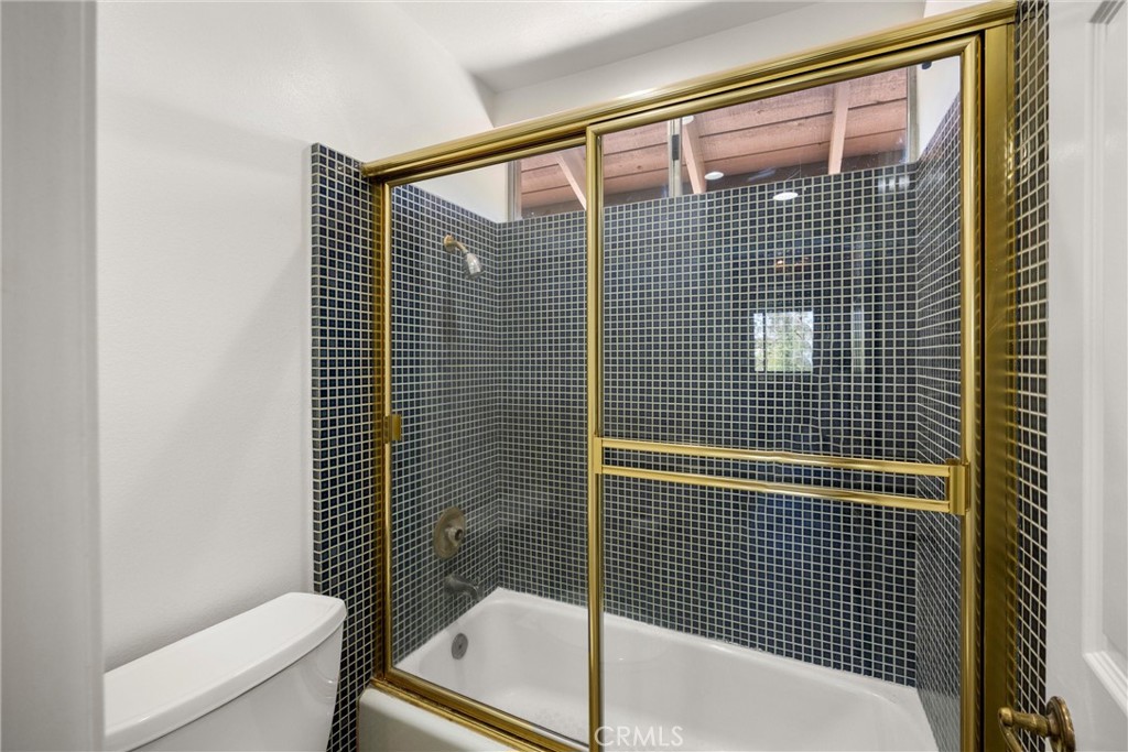 5895 Jadeite Avenue Rancho Cucamonga, CA 91737 - Photo 43 of 71 a bathroom with a sink toilet and shower