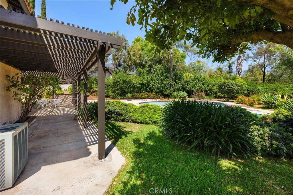 5895 Jadeite Avenue Rancho Cucamonga, CA 91737 - Photo 53 of 71 a view of a backyard with plants and outdoor seating