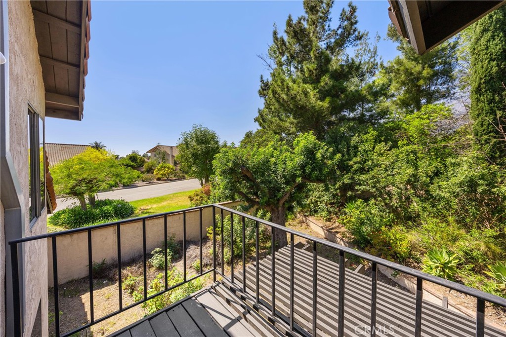 5895 Jadeite Avenue Rancho Cucamonga, CA 91737 - Photo 63 of 71 a view of balcony with wooden floor and fence