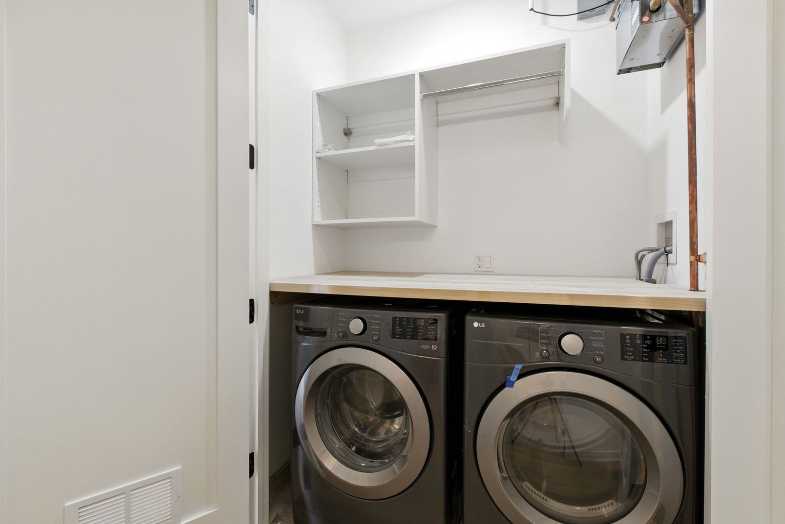 1443 West Roscoe Street, Unit 1 Chicago, IL 60657 - Photo 15 of 15 a utility room with dryer and washer