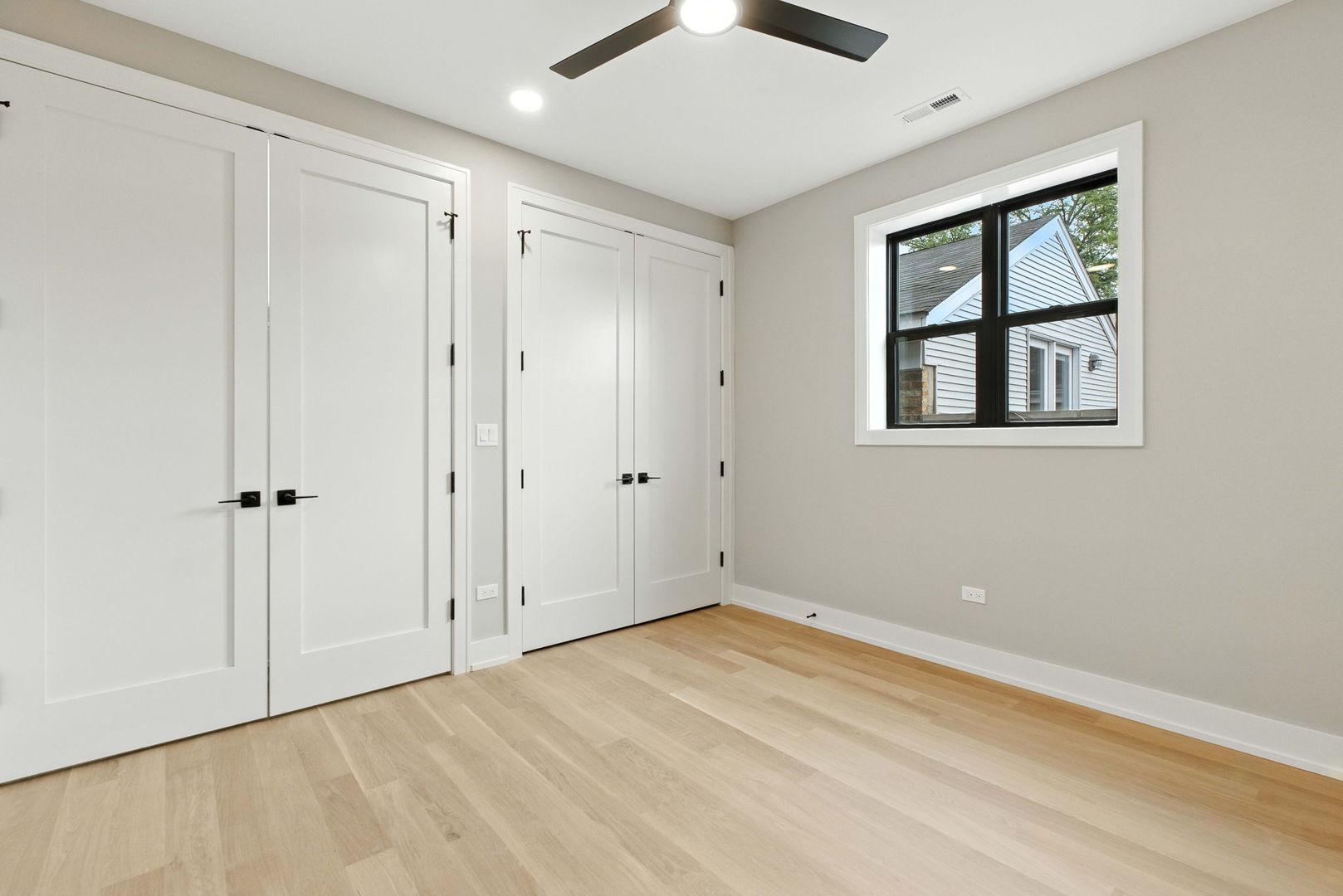1443 West Roscoe Street, Unit 1 Chicago, IL 60657 - Photo 10 of 15 a view of an empty room with a window