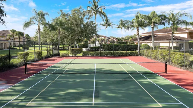 a tennis court that has tennis net
