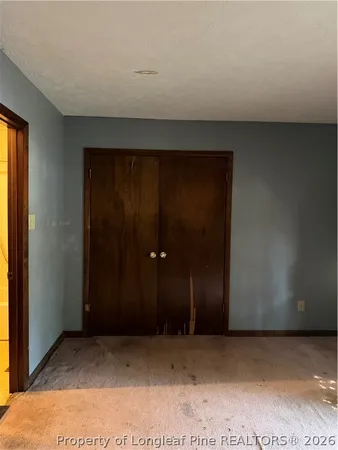 an empty room with closet