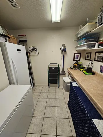 a room with furniture and a view of living room