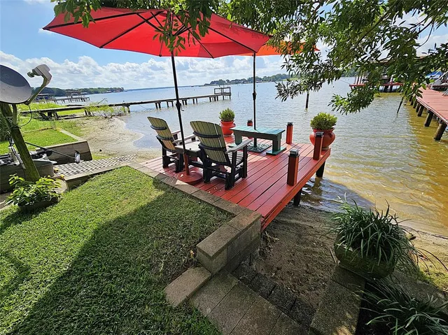 a wooden pier with water