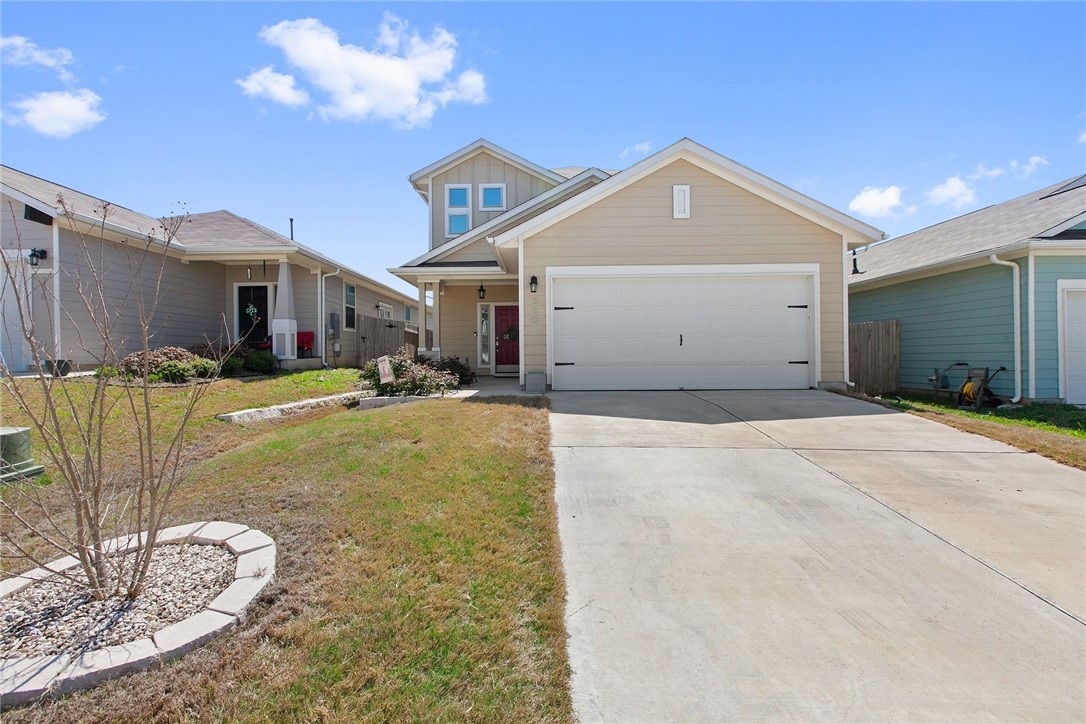 230 Guemal Road Buda, TX 78610 - Photo 1 of 1 a front view of a house with a yard