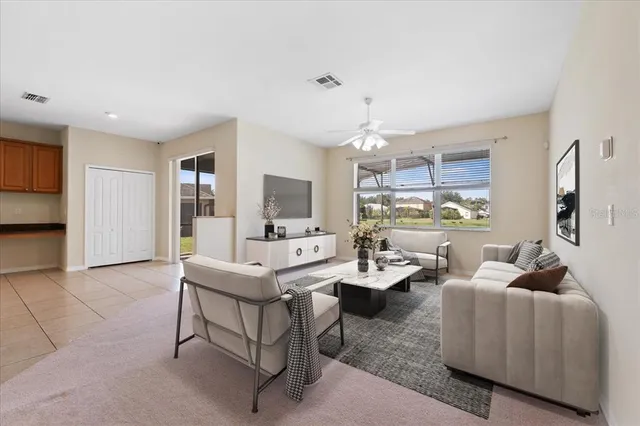 a view of a big room with closet and windows