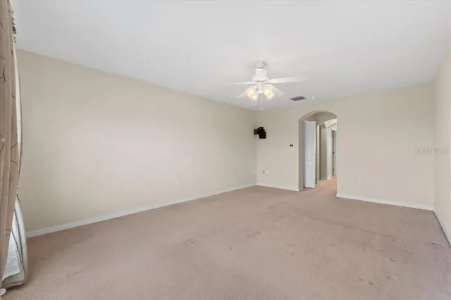 a spacious bathroom with a bathtub and a shower