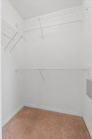 a bathroom with a double vanity sink mirror and toilet