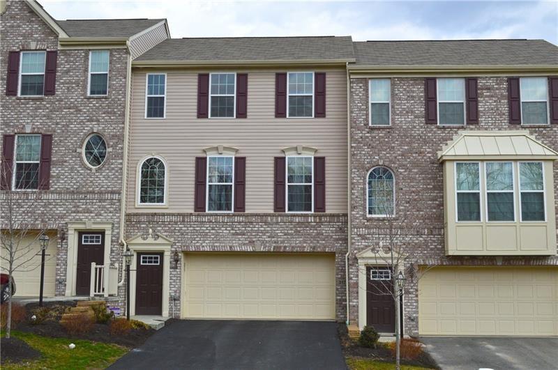 317 Maple Ridge Drive Canonsburg, PA 15317 - Photo 1 of 20 a front view of a house with a yard