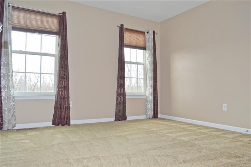 317 Maple Ridge Drive Canonsburg, PA 15317 - Photo 17 of 20 an empty room with windows