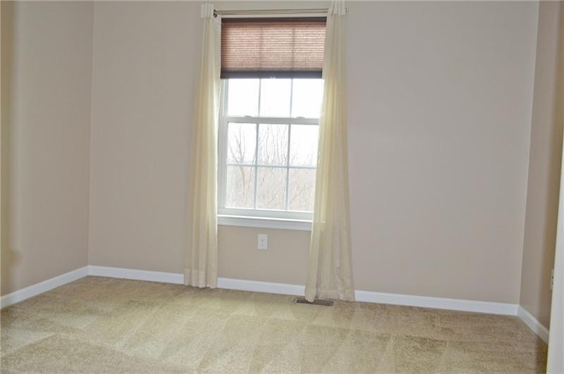 317 Maple Ridge Drive Canonsburg, PA 15317 - Photo 18 of 20 an empty room with a window
