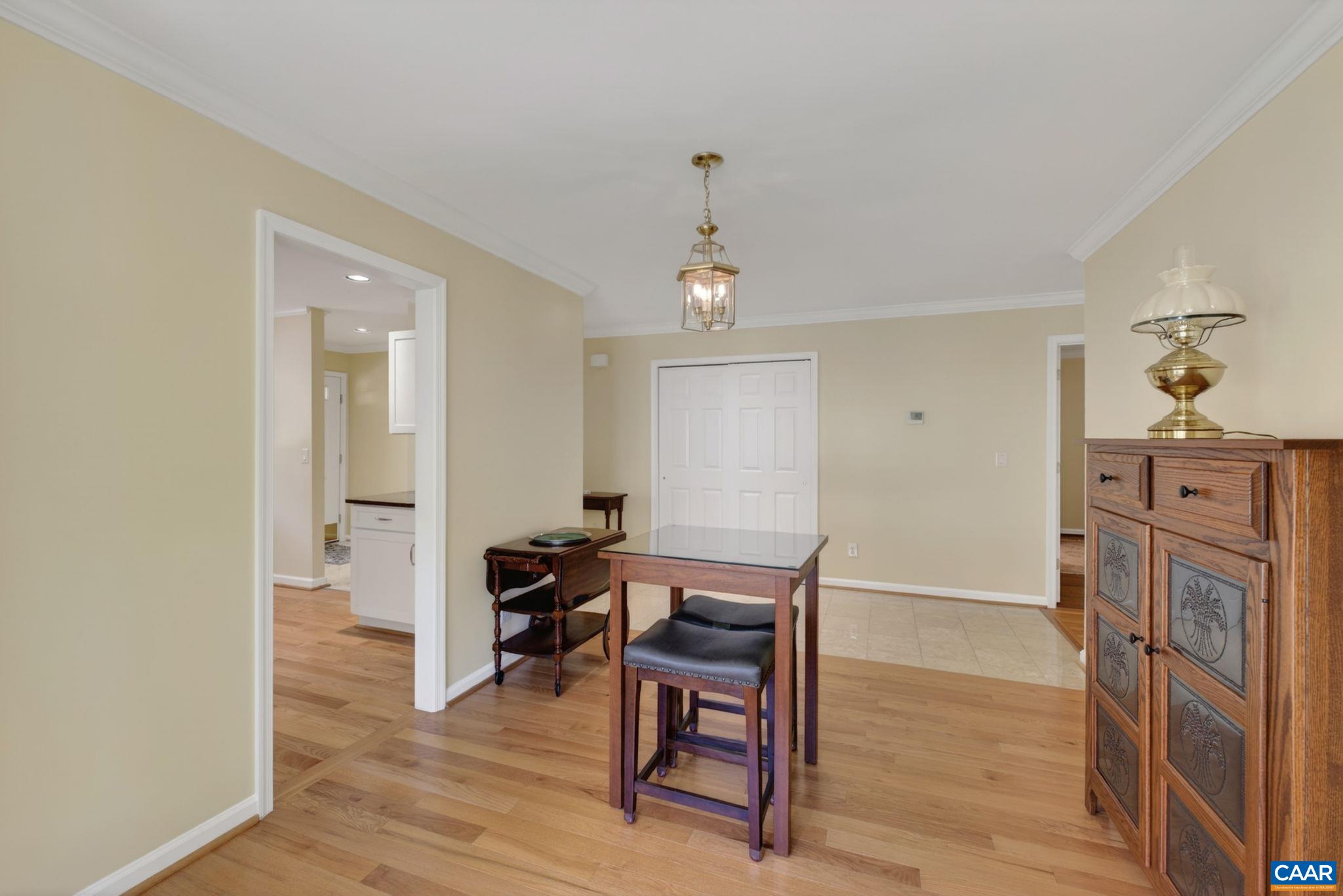 590 Mockingbird Way Charlottesville, VA 22901 - Photo 10 of 43 a view of a workspace with furniture and wooden floor