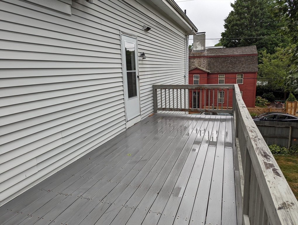 33 Merrill Street, Unit 3 Newburyport, MA 01950 - Photo 14 of 17 a view of wooden balcony with a sink