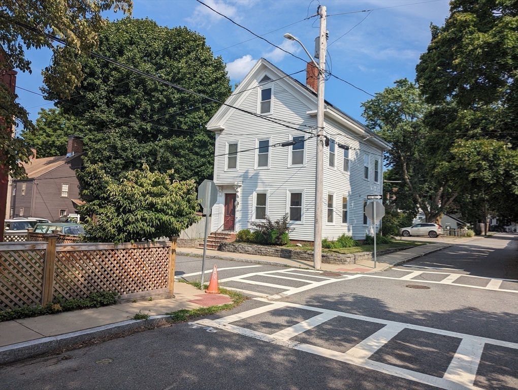 33 Merrill Street, Unit 3 Newburyport, MA 01950 - Photo 17 of 17 a view of a white house with a street