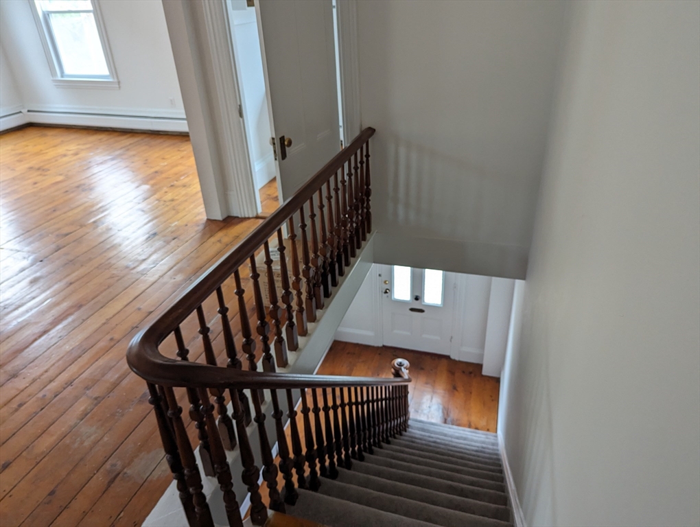 33 Merrill Street, Unit 3 Newburyport, MA 01950 - Photo 3 of 17 a view of entryway with wooden floor