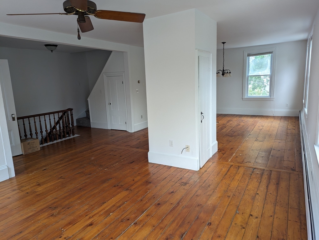 33 Merrill Street, Unit 3 Newburyport, MA 01950 - Photo 7 of 17 a view of a livingroom with wooden floor