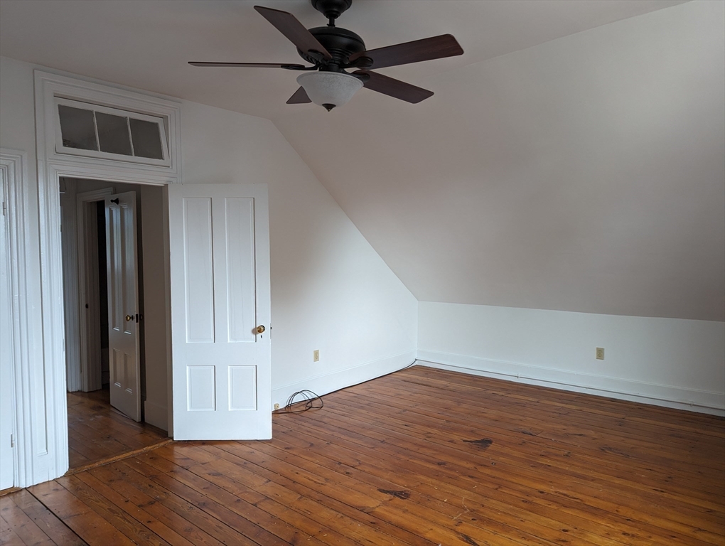 33 Merrill Street, Unit 3 Newburyport, MA 01950 - Photo 9 of 17 wooden floor in an empty room