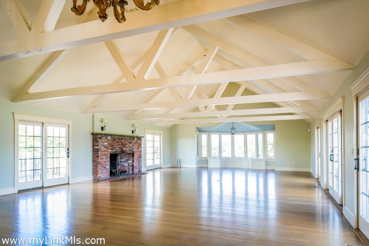 56 North Neck Road Edgartown, MA 02539 - Photo 14 of 63 a view of an entryway with wooden floor