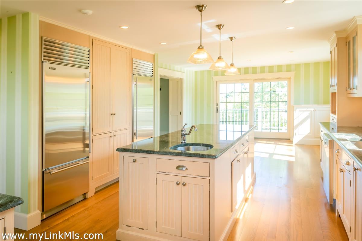 56 North Neck Road Edgartown, MA 02539 - Photo 17 of 63 a bathroom with a granite countertop sink a large mirror and a bathtub