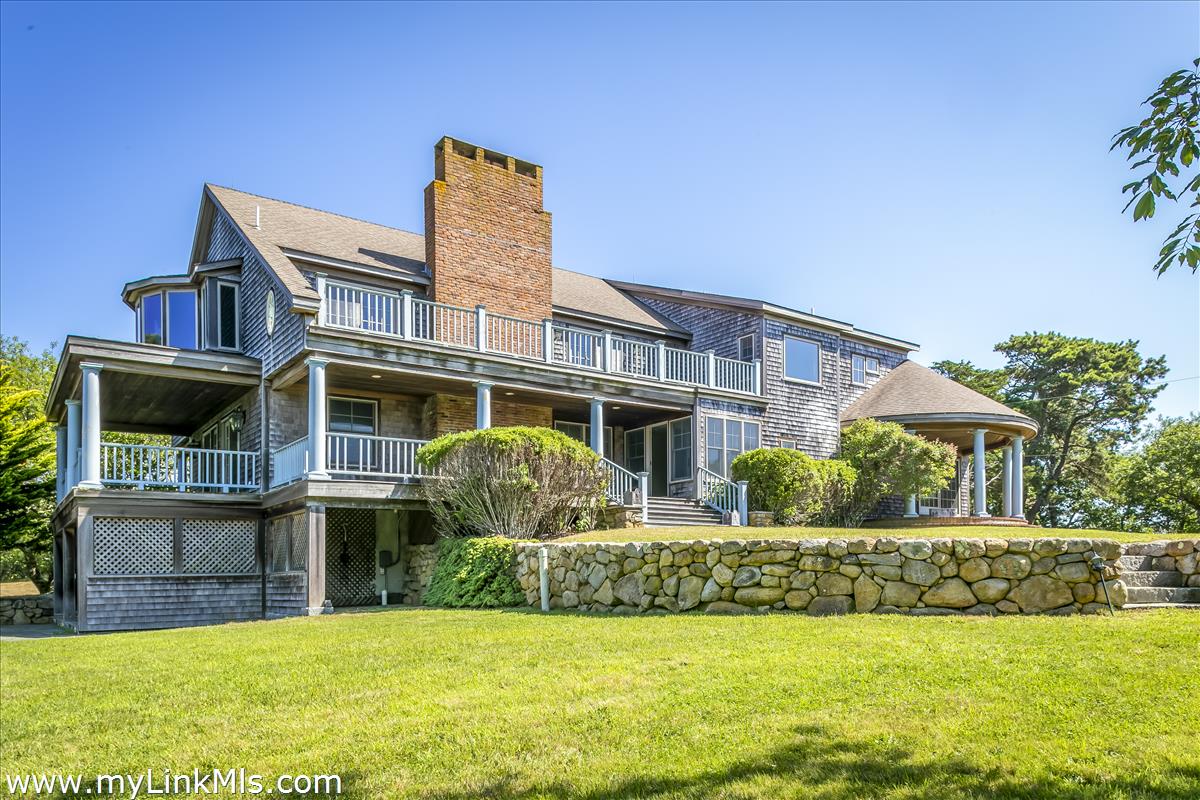 56 North Neck Road Edgartown, MA 02539 - Photo 3 of 63 a front view of house with yard and trees