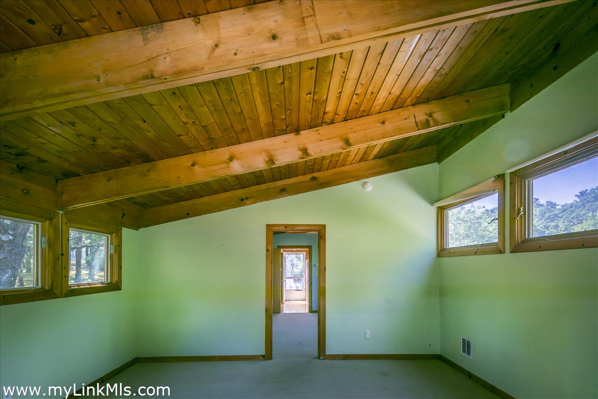 56 North Neck Road Edgartown, MA 02539 - Photo 37 of 63 Bunk House bedroom to kitchen