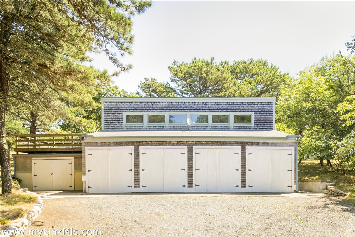 56 North Neck Road Edgartown, MA 02539 - Photo 38 of 63 a front view of a house with a yard