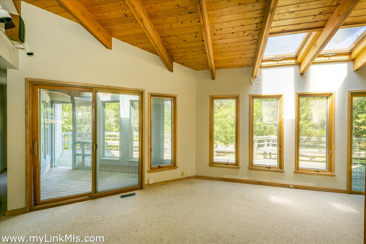 56 North Neck Road Edgartown, MA 02539 - Photo 44 of 63 a view of an empty room with windows