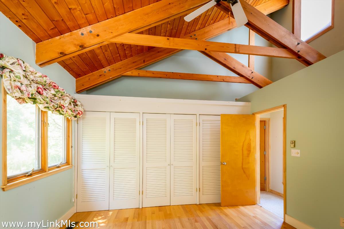 56 North Neck Road Edgartown, MA 02539 - Photo 51 of 63 a view of a room with wooden floor and door