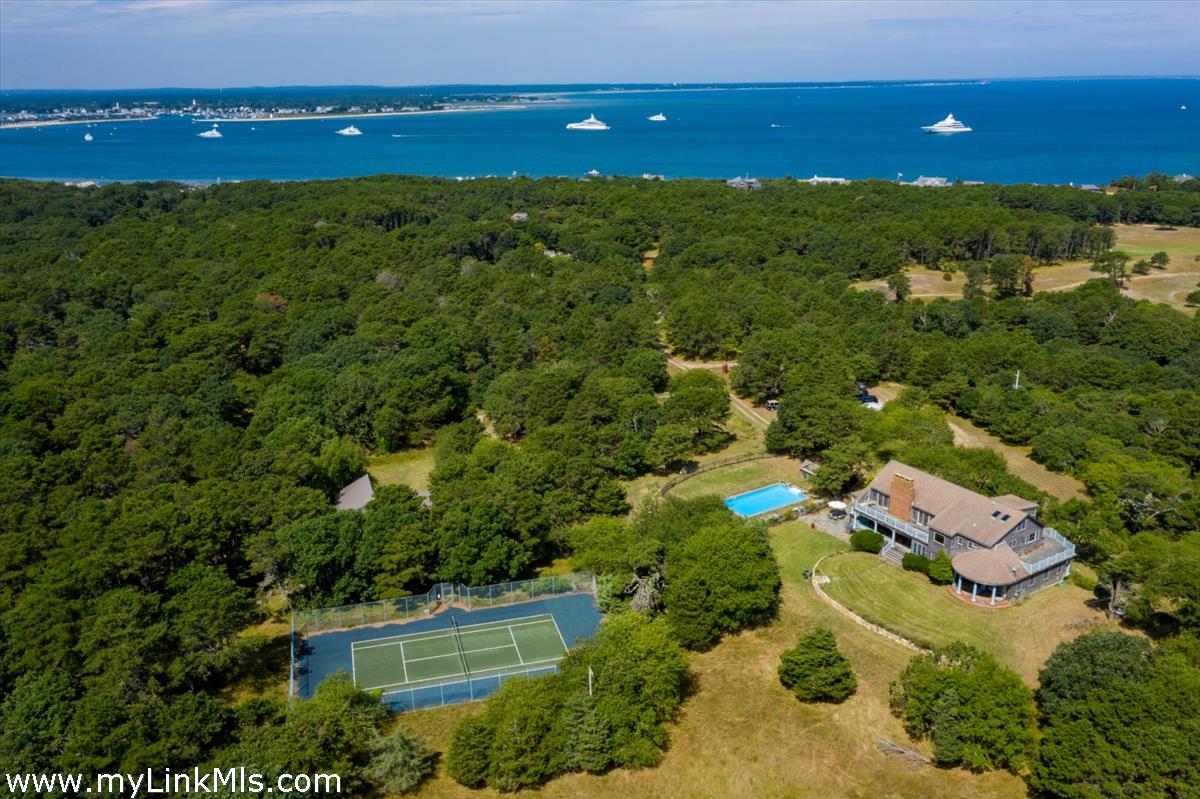 56 North Neck Road Edgartown, MA 02539 - Photo 57 of 63 a view of a house with a yard