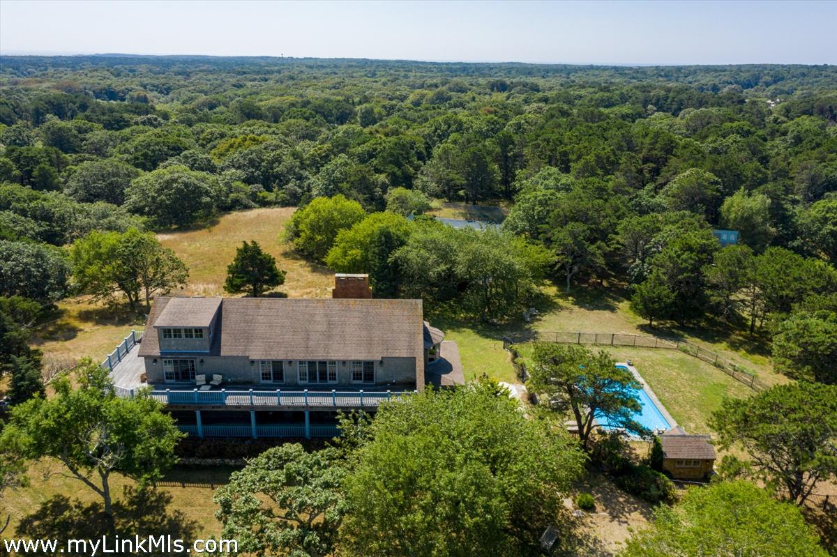 56 North Neck Road Edgartown, MA 02539 - Photo 61 of 63 an aerial view of a house with a yard