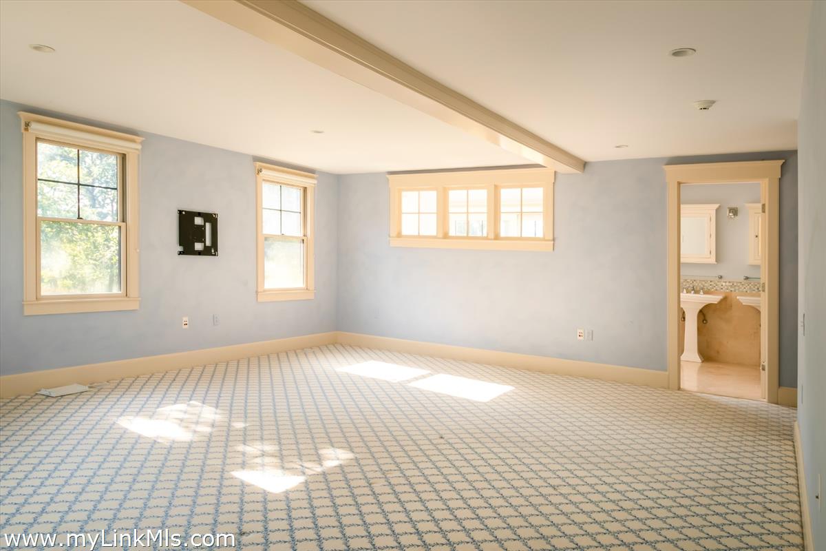 56 North Neck Road Edgartown, MA 02539 - Photo 9 of 63 a view of an empty room and window