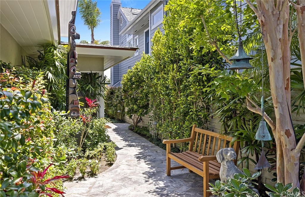 7 Beacon Bay Newport Beach, CA 92660 - Photo 16 of 59 a garden with trees in front of it